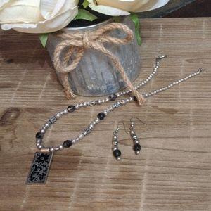 Black and silver necklace and earrings